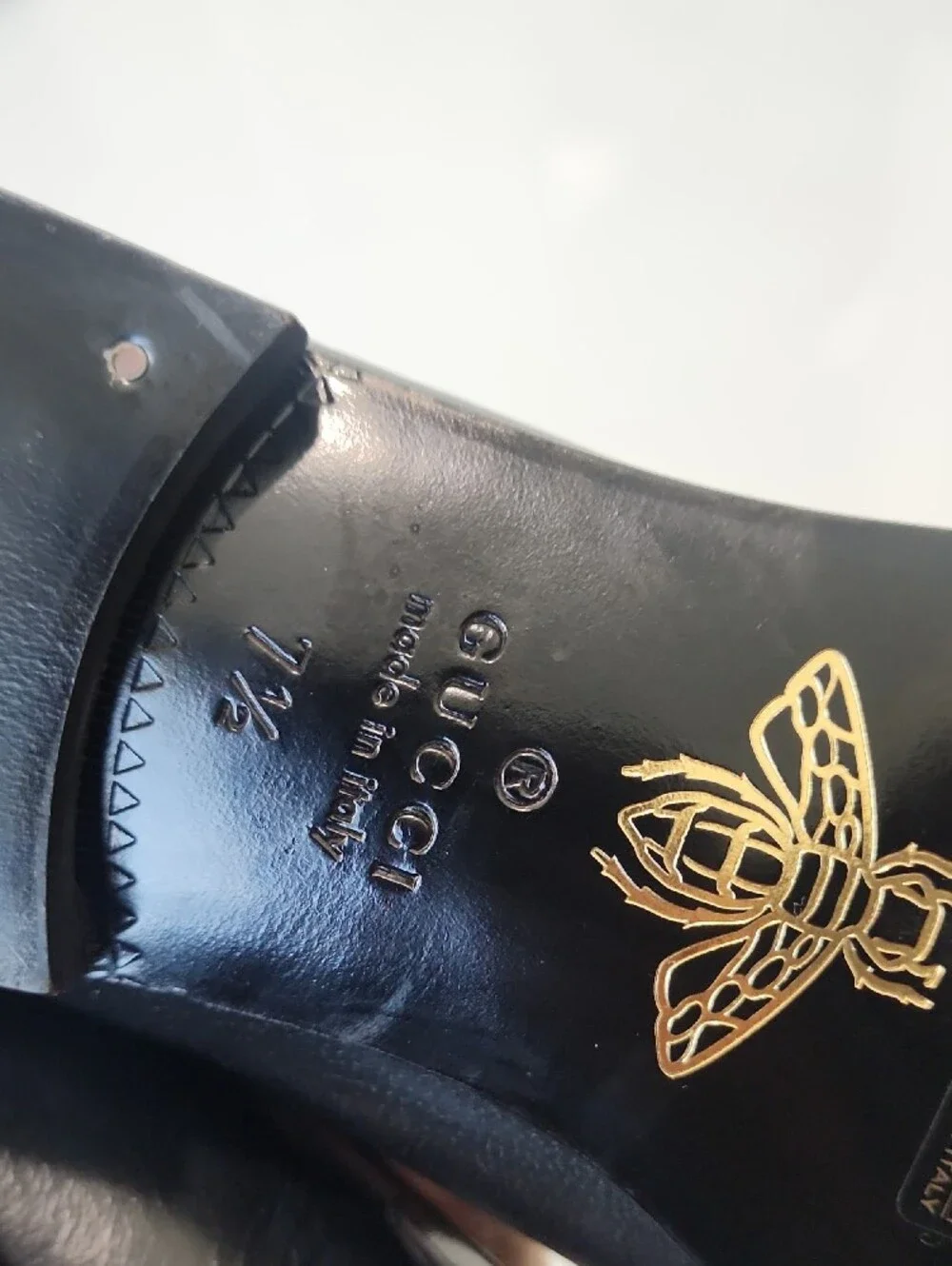 Gucci Black Leather Tassel Loafers with Gold Cat Accent